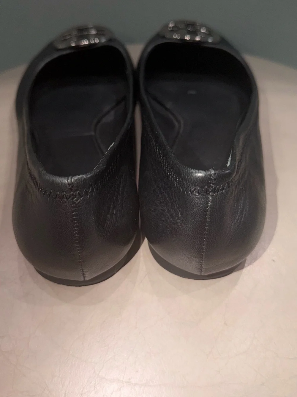 Tory Burch Reva black leather ballet flats silver medallion emblem size 8M